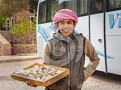 Sinai / Egypt - 03/25/2016: A young bedouin sells souvenirs at the foot of Mount Sinai on the territory of St. Catherineâ€™s Editorial Stock Photo